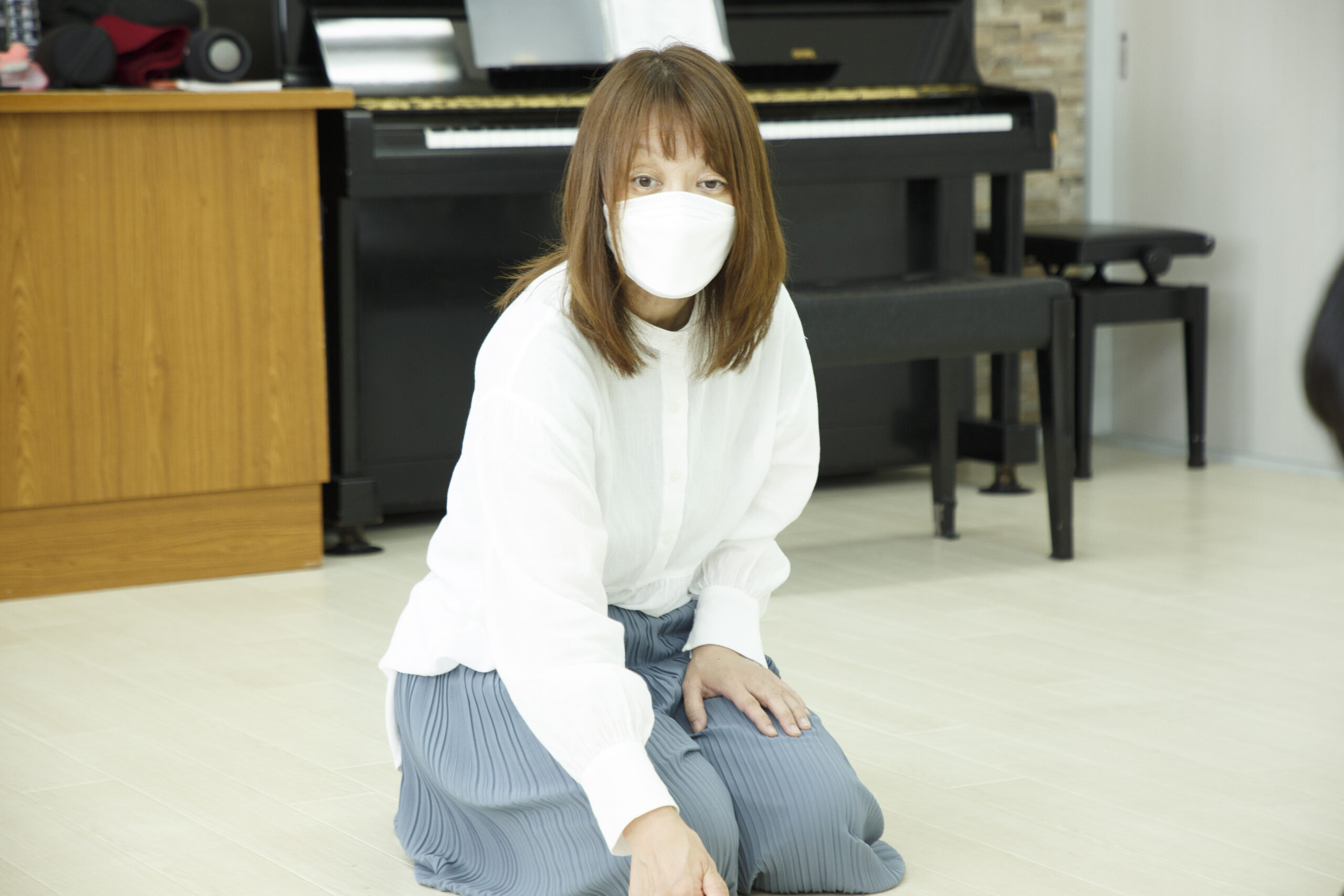 公式サイトの音楽療育紹介に掲載された講師の写真
